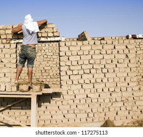 The new house, built of clay blocks, a specialist master
