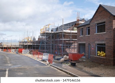 New House Construction In UK, Typical Housing Development With Scaffold