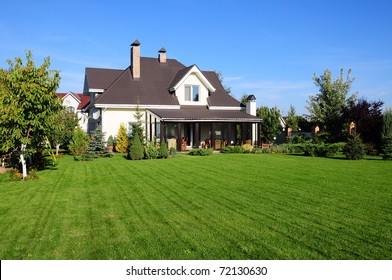 A new house with a garden in a rural area 
