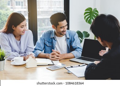 New House / Home Moving And Relocation Concept. Happy Asian Couple Talking With Apartment Landlord From Real Estate Agent / Realtor.