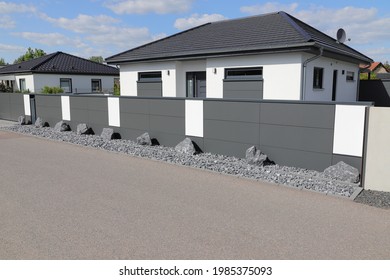 A New House With A Metal Garden Fence