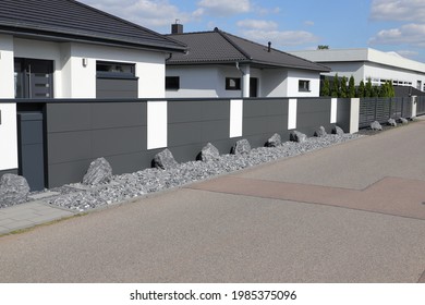 A New House With A Metal Garden Fence