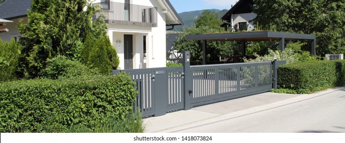 A New House With A Metal Sliding Gate