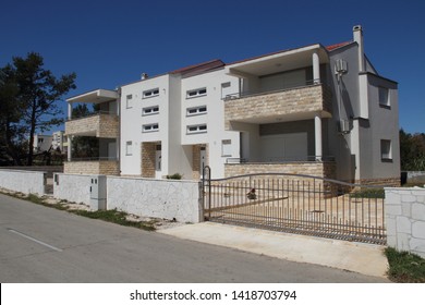 A New House With A Metal Sliding Gate