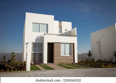 new house for sale, minimalist design ideal for living - Shutterstock ID 1324165532