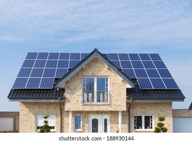 New House With Solar Panels On Its Roof