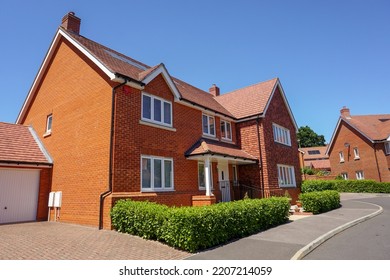 New Housing On Suburban Estate. New Build Houses In Quiet Neighbourhood 