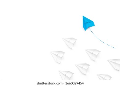 New Ideas Creativity And Different Innovative Solution. Business Concept. A Group Of Paper Airplanes, One Plane Is Flying In The Other Direction, Different Way.