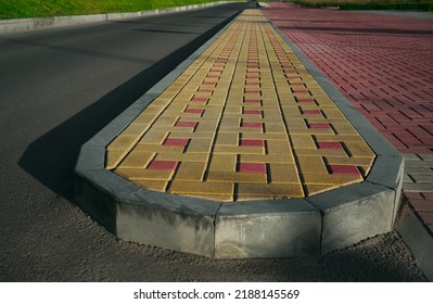 New Infiltration Parking Lot Made Of Concrete Tiles In A Square  Filled. In Connection With The Asphalt Road And The Sidewalk With Paving. Empty Bike And Walking Path Near Road.