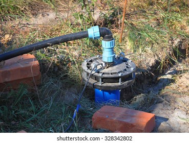 New Installed Water Bore. Pumping air from compressor into from new constructed water bore or well as process of cleaning and filtrating water.