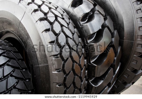 New, large tires\
of a bus garage, truck\
tires