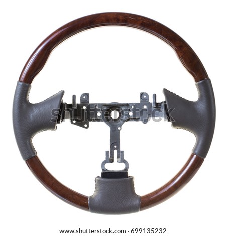 New leather steering wheel with wooden insets on white background