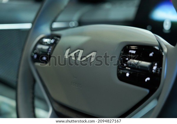 A new logo of Kia, a\
Korean automobile company, is embedded on the car handle. It\'s the\
handle of K8.