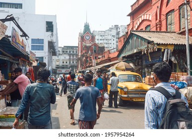 New Market, Kolkata, 03-27-20: Local People And Market Vendors Walking Through Congested Street Near The Iconic Hog Market, A Heritage Building. Though Pandemic Time, No One Is Wearing Face Mask.