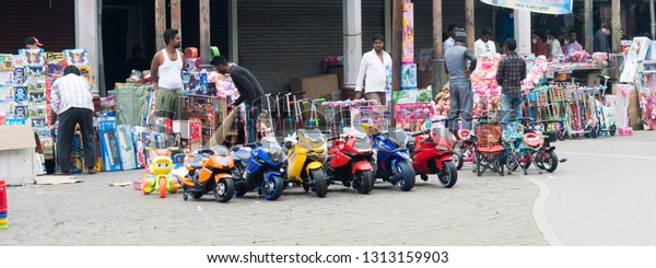 New Market, Kolkata, December 2,\
2018: Flea market with of toy cars for display outside in Hogg\
Market also called New Market during Christmas\
festival..