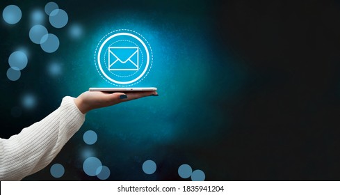 New Messages On Mobile Phone, Businessman Hands Open Mailbox To View Pending E-mail Communication, Copy Space.On Empty Blue Background