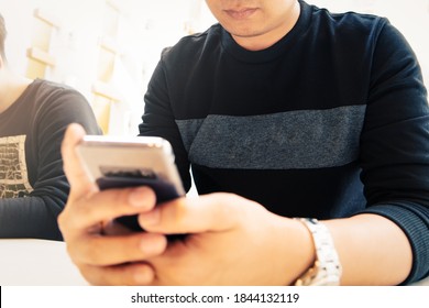 New Messages On Smartphone, Man Looking At Mobile Phone Checkin