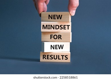 New mindset and results symbol. Concept words New mindset for new results on wooden blocks. Beautiful grey table grey background. Businessman hand. Business new mindset for results concept. Copy space - Shutterstock ID 2258518861