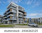 New modern block of flats in green area. residential apartment with flat buildings exterior. luxury house complex. Part of City Real estate property, condo architecture. apartment insurance concept.