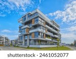 New modern block of flats in green area. residential apartment with flat buildings exterior. luxury house complex. Part of City Real estate property, condo architecture. apartment insurance concept.