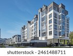 New modern block of flats in green area. residential apartment with flat buildings exterior. luxury house complex. Part of City Real estate property, condo architecture. apartment insurance concept.