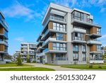 New modern block of flats in green area. residential apartment with flat buildings exterior. luxury house complex. Part of City Real estate property, condo architecture. apartment insurance concept.