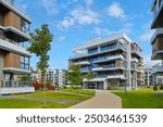 New modern block of flats in green area. residential apartment with flat buildings exterior. luxury house complex. Part of City Real estate property, condo architecture. apartment insurance concept.