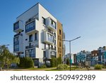 New modern block of flats in green area. residential apartment with flat buildings exterior. luxury house complex. Part of City Real estate property, condo architecture. apartment insurance concept.