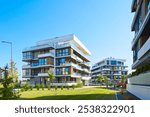 New modern block of flats in green area. residential apartment with flat buildings exterior. luxury house complex. Part of City Real estate property, condo architecture. apartment insurance concept.