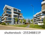 New modern block of flats in green area. residential apartment with flat buildings exterior. luxury house complex. Part of City Real estate property, condo architecture. apartment insurance concept.