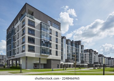 New modern block of flats in green area. residential apartment with flat buildings exterior. luxury house complex. Part of City Real estate property, condo architecture. apartment insurance concept. - Shutterstock ID 2248466965