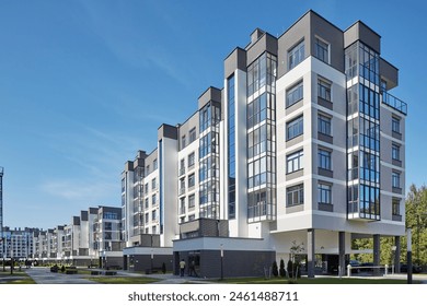 New modern block of flats in green area. residential apartment with flat buildings exterior. luxury house complex. Part of City Real estate property, condo architecture. apartment insurance concept. - Powered by Shutterstock