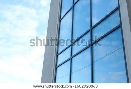 New modern building with tinted windows outdoors