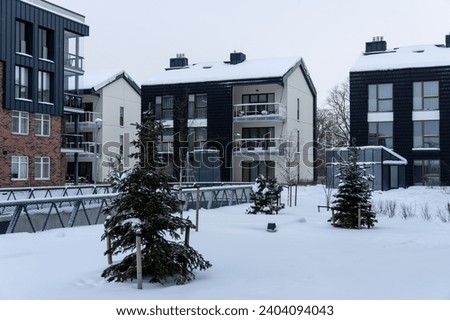 New modern buildings during winter time with a lot of snow. Uus-Veerenni district. Tallinn, Estonia, Europe. December 2023.