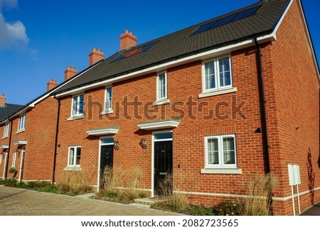 New modern built houses in England UK. Fresh new homes on new housing estate.