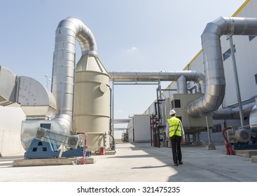 New modern industrial waste plant pipelines from the outside. Waste-to-energy plant.  Produces a combustible fuel commodity, such as methane, methanol, ethanol and synthetic fuels.