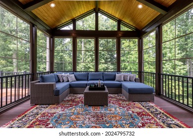 New Modern Screened Porch With Patio Furniture, Summertime Woods In The Background.