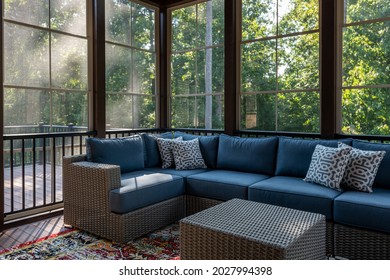 New Modern Screened Porch With Patio Furniture, Summertime Woods In The Background.