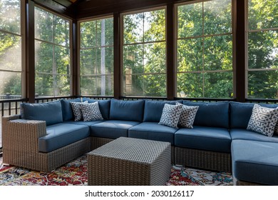 New Modern Screened Porch With Patio Furniture, Summertime Woods In The Background.