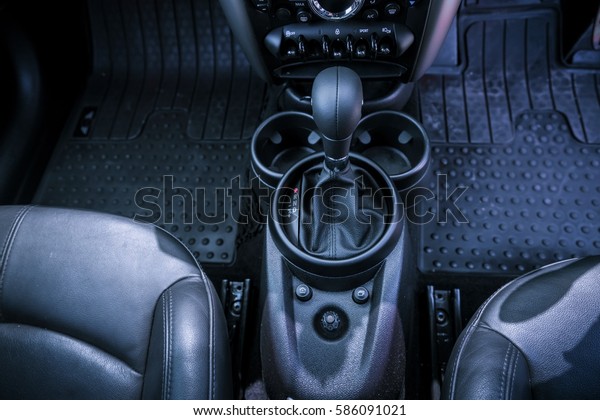 New modern\
sport car interior. Top View of the interior of a modern car.\
 -\
Automatic transmission gear\
stick