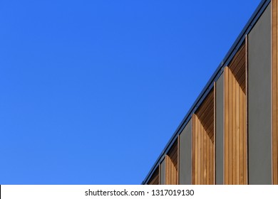 New Modern Town House Development Taken From An Extreme Angle. The Windows Of The Townhouses Are Framed With Panels Of Timber. Inner West, Sydney