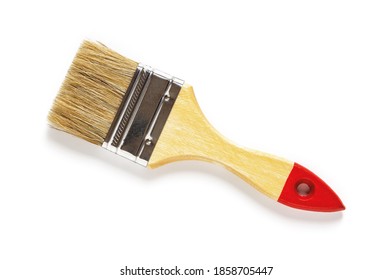 New natural bristle paint brush with red tip wooden handle isolated on white background. Design element for construction painting work, repair and redecorate concepts. Top view. - Shutterstock ID 1858705447