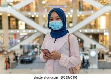 New Normal Concept, Cute Malay Girl At The Mall Going Shopping Wearing Face Mask