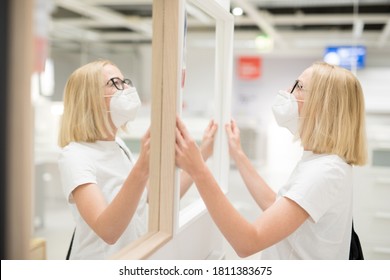 New Normal During Covid Epidemic. Caucasian Woman Shopping At Retail Furniture And Home Accessories Store Wearing Protective Medical Face Mask To Prevent Spreading Of Corona Virus.