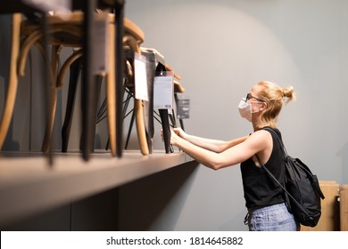 New Normal During Covid Epidemic. Caucasian Woman Shopping At Retail Furniture And Home Accessories Store Wearing Protective Medical Face Mask To Prevent Spreading Of Corona Virus.