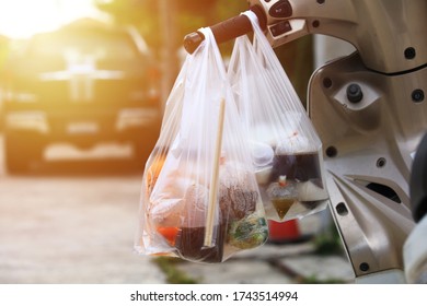 New Normal Lifestyle, Bog Pack Food Back To Home, Food In Plastic Bag Hang On Motorcycle