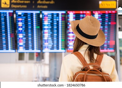 New Normal Travel Domestic Flight Asian Woman Wearing Face Mask Searching Flight On Timetable In Airport