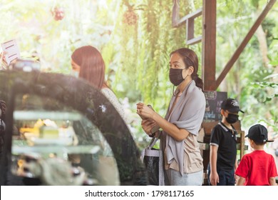 New Normal Women In Protective Face Mask Queuing At Cafe Counter