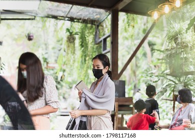 New Normal Women In Protective Face Mask Queuing At Cafe Counter