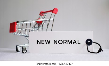 New Normal Word With Shopping Cart, Coronavirus Pandemic Concept.